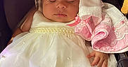 Mary Rose joined the competition — help win amazing prizes! baby, infant, child, sleeping, portrait, car_seat, dress, white_dress, pink_clothing, bow, headband, blanket, cushion, harness, feet, shoes, indoor, close_up, sitting, sleepy