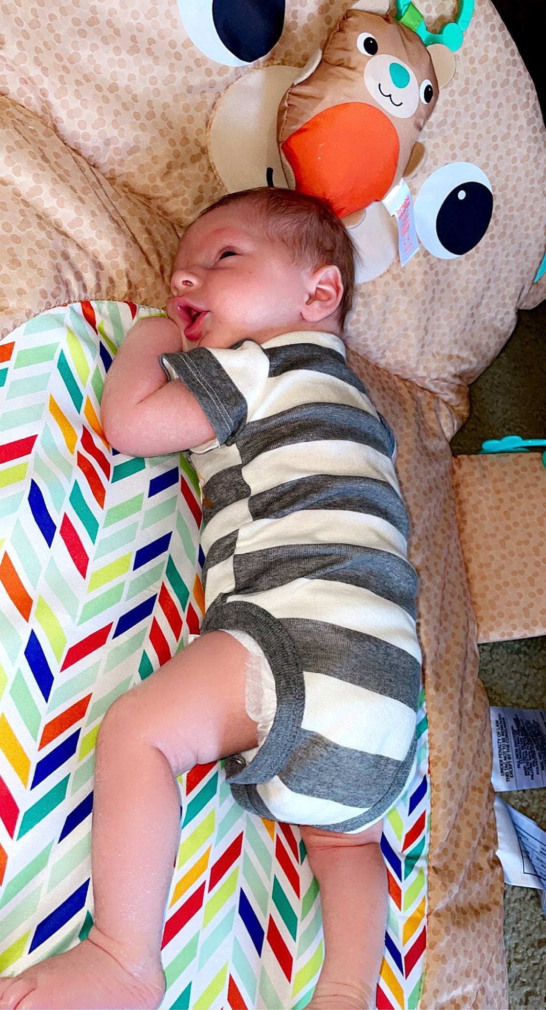 Reece is registered to the contest to win money with this photo: baby, baby_sleeping, baby_toddler_clothing, cheek, child, comfort, linens, organ, pattern, people, person, product, red, room, skin, sleeve, textile, toddler, toy, white