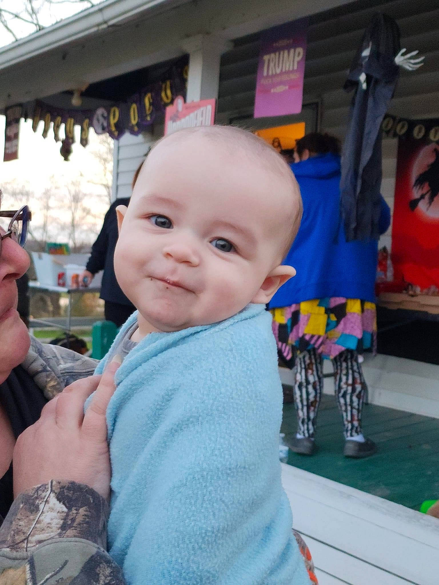 Louis is registered to the contest to win money with this photo: baby, baby_toddler_clothing, child, chin, event, flag, flooring, fun, happy, joy, leisure, person, recreation, sitting, smile, t_shirt, thumb, toddler, travel, vacation