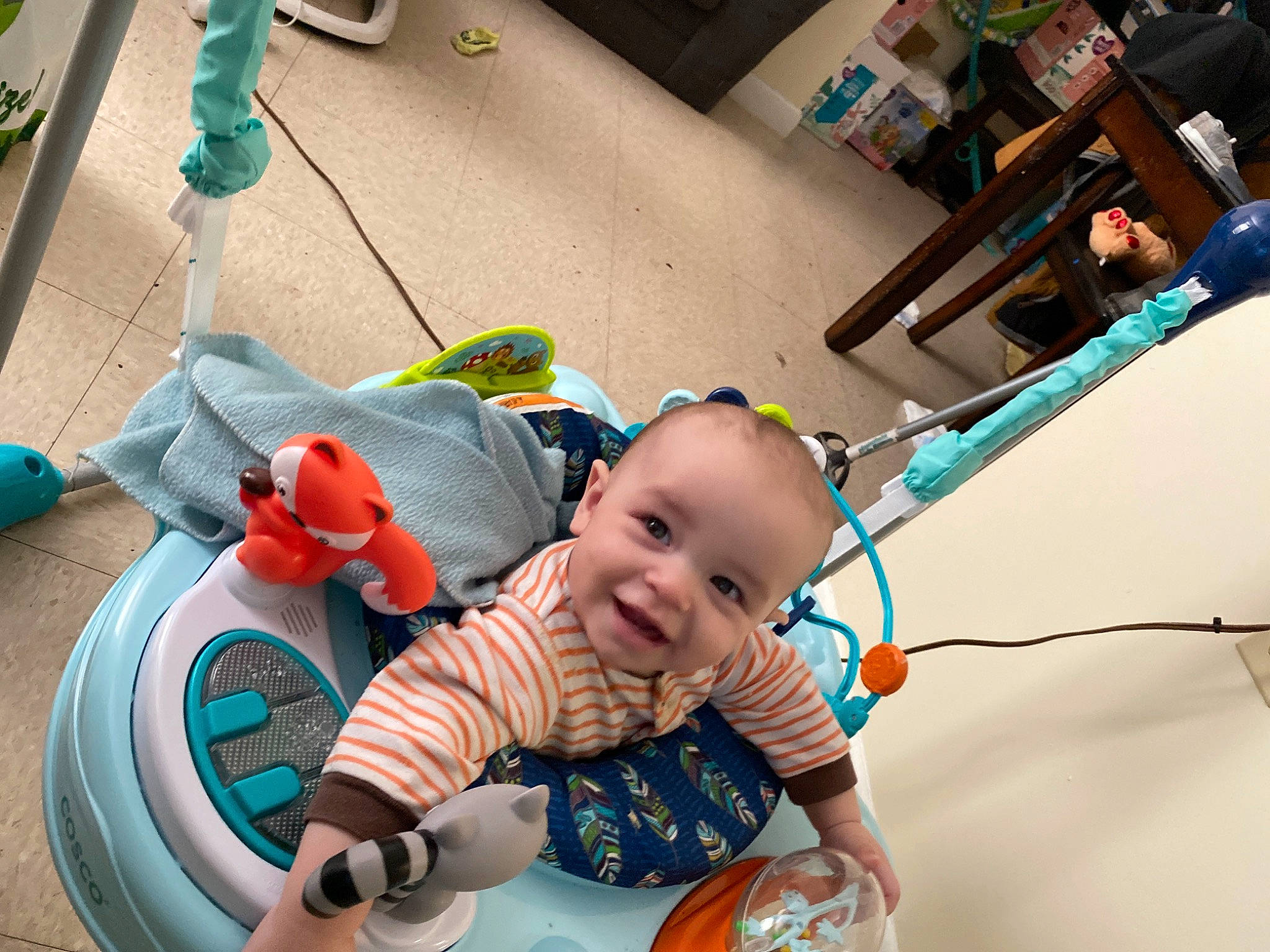 Louis is registered to the contest to win money with this photo: baby, baby_products, baby_toddler_clothing, baby_toys, chair, child, comfort, facial_expression, flooring, fun, grass, green, happy, leisure, person, play, sitting, skin, smile, toddler