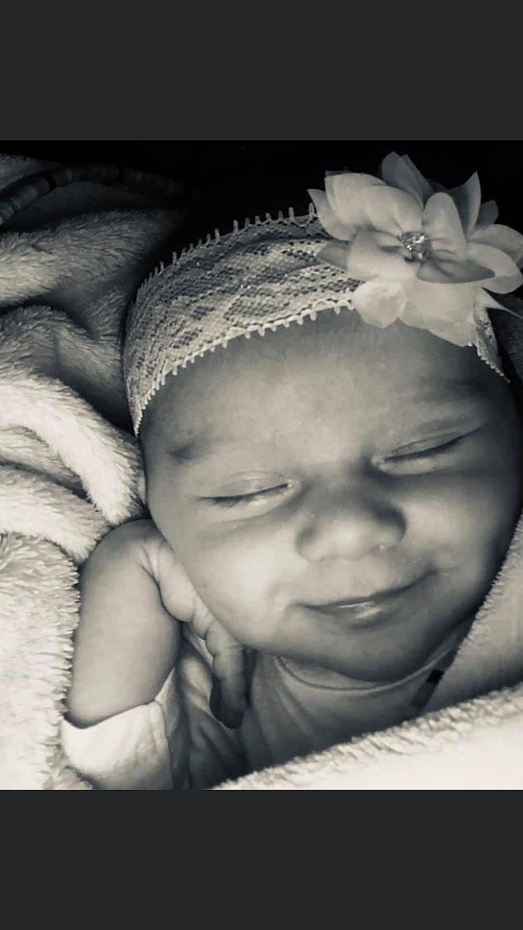 Eva joined the competition — help win amazing prizes! baby, baby_sleeping, black_and_white, cheek, child, face, forehead, hair_accessory, head, headgear, headpiece, headwear, monochrome_photography, person, photograph, photography, portrait, portrait_photography, smile, snapshot