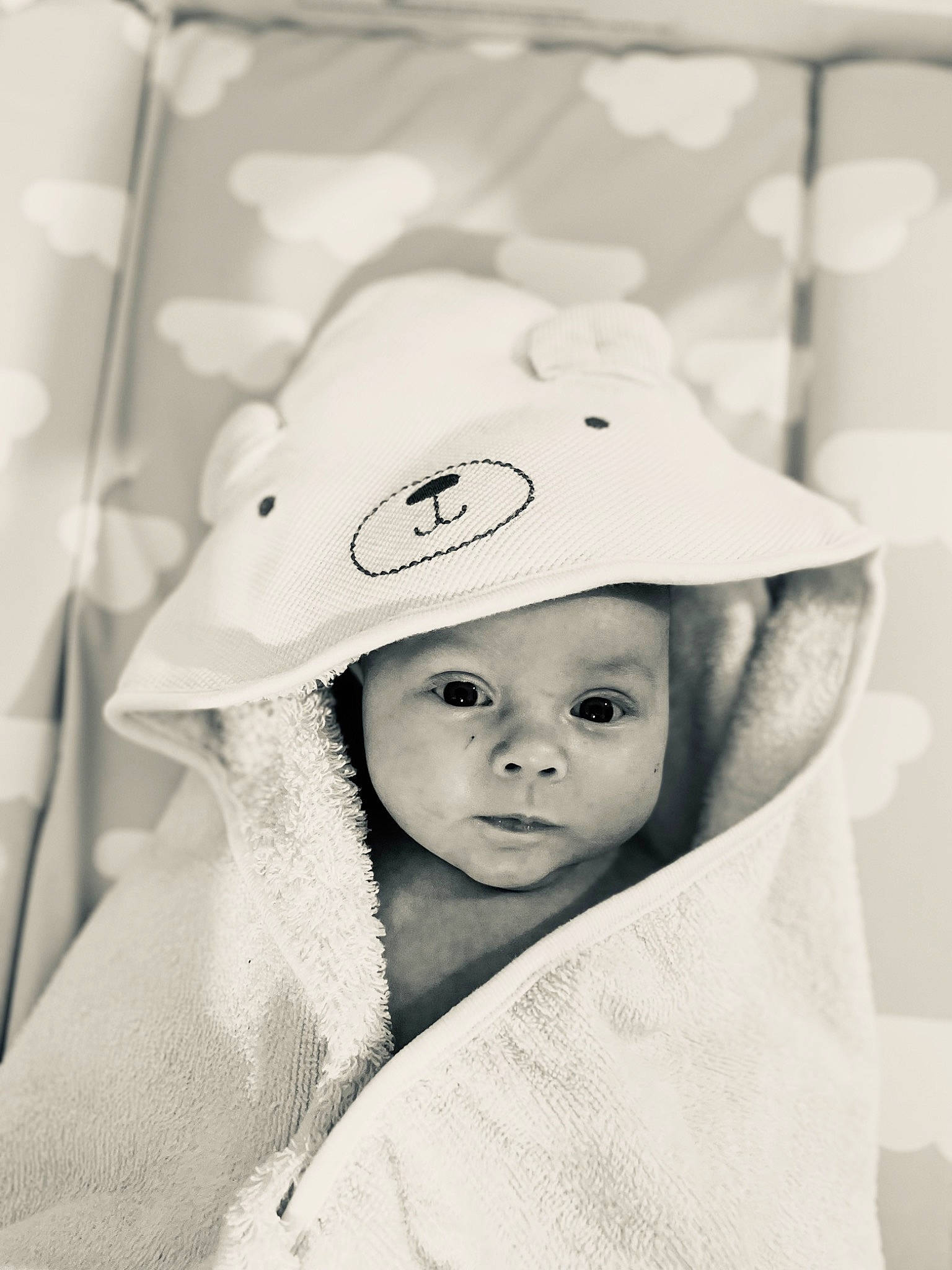 Maisie is registered to the contest to win money with this photo: baby, baby_products, baby_safety, baby_toddler_clothing, cap, child, comfort, eyelash, fashion_accessory, flash_photography, fun, happy, headwear, laugh, monochrome, monochrome_photography, person, portrait, portrait_photography, sleeve