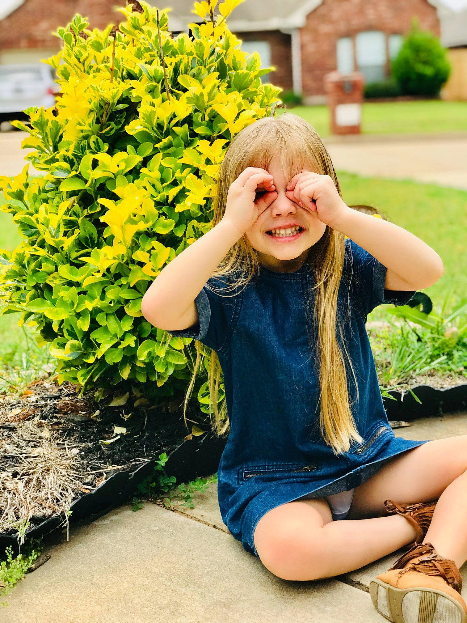 Nola is registered to the contest to win money with this photo: beauty, blond, blue, botany, facial_expression, flower, grass, hair, hairstyle, happy, leg, long_hair, people_in_nature, person, plant, sitting, smile, spring, summer, thigh