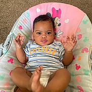 Josefina joined the competition — help win amazing prizes! baby, infant, child, mickey_mouse, minnie_mouse, seat, striped_shirt, explorer_text, diaper, carpet, indoor, playful, happy, cute, hands, feet, smiling, person, young_child, colorful