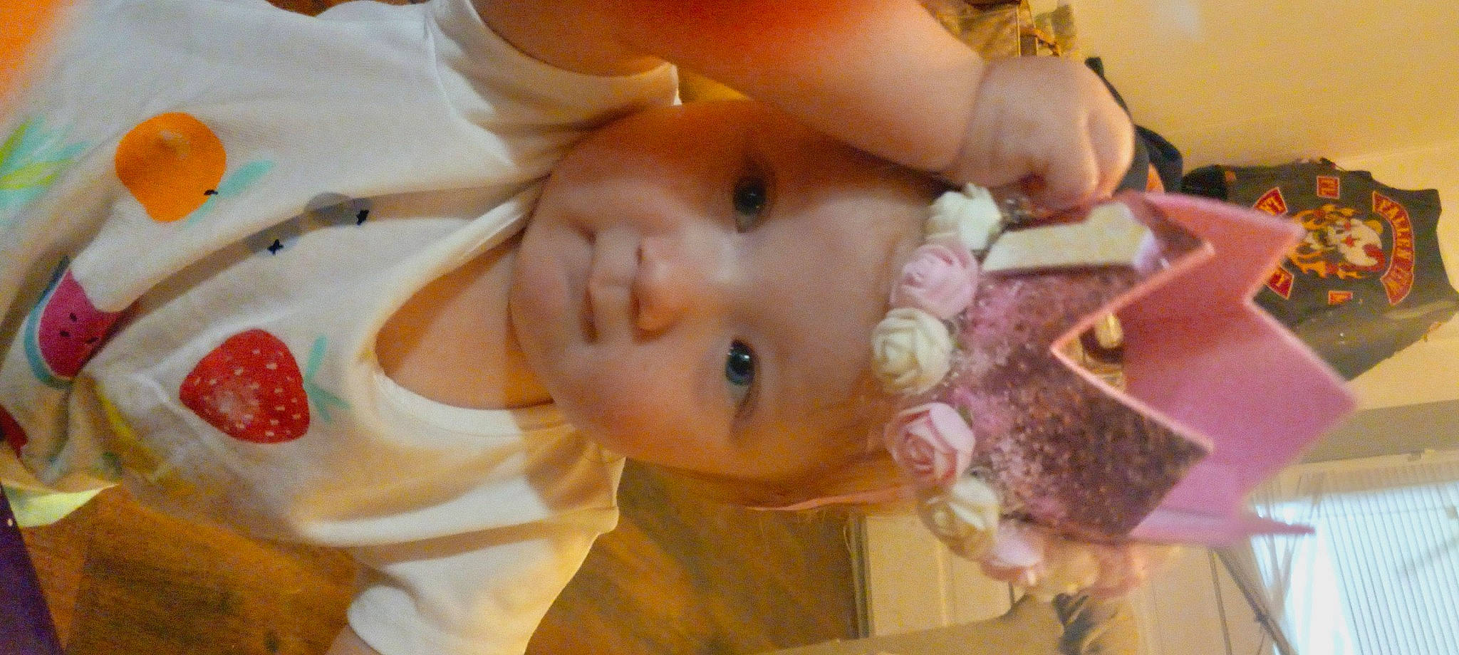 Harley is registered to the contest to win money with this photo: baby, cheek, child, dress, ear, eye, eyelash, finger, hand, happy, iris, lip, mouth, nose, person, plant, skin, toddler, toy, tree