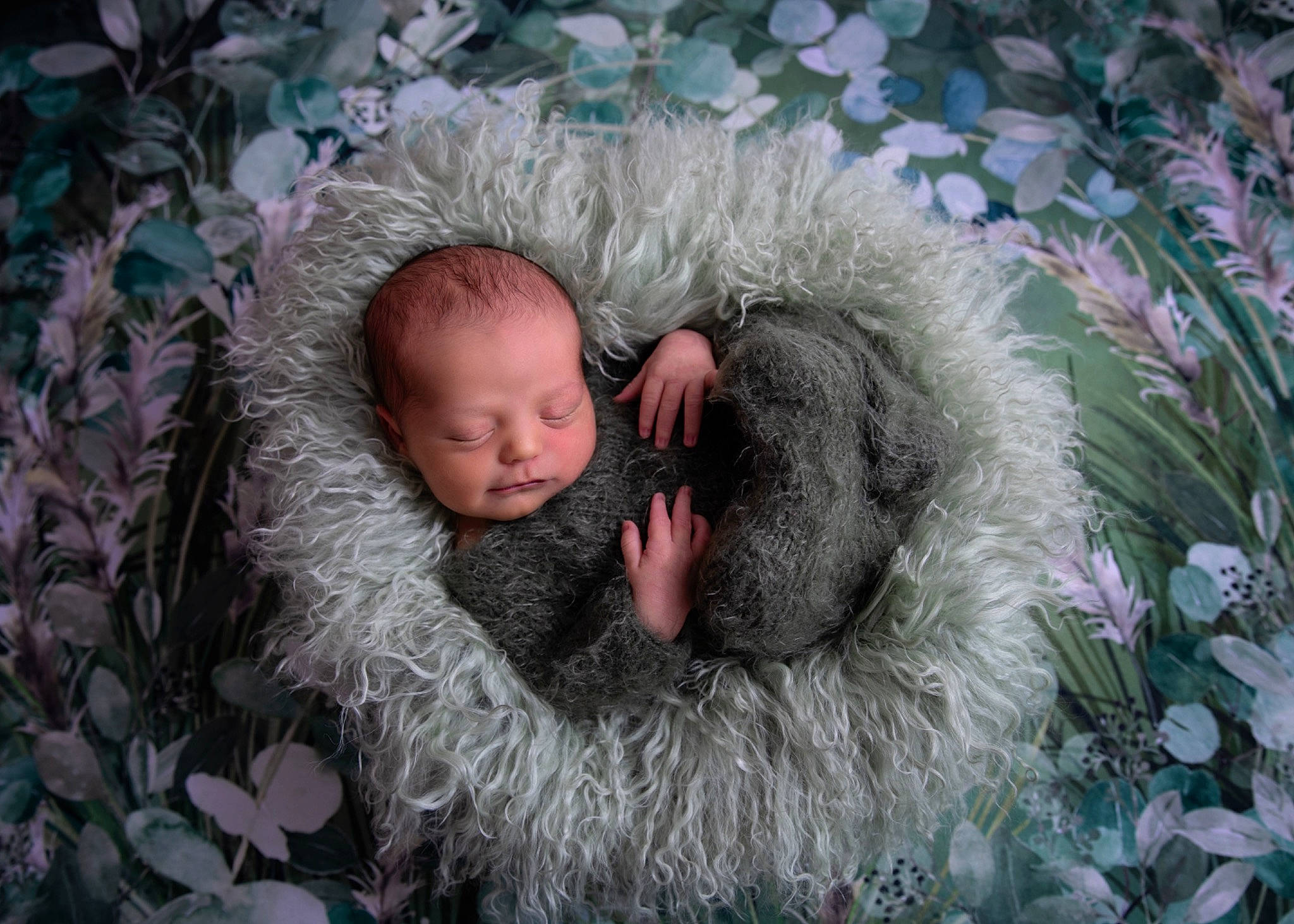 Brock is registered to the contest to win money with this photo: baby, beard, comfort, freezing, frost, fur, fur_clothing, grass, groundcover, linens, person, plant, toddler, tree, winter, wool