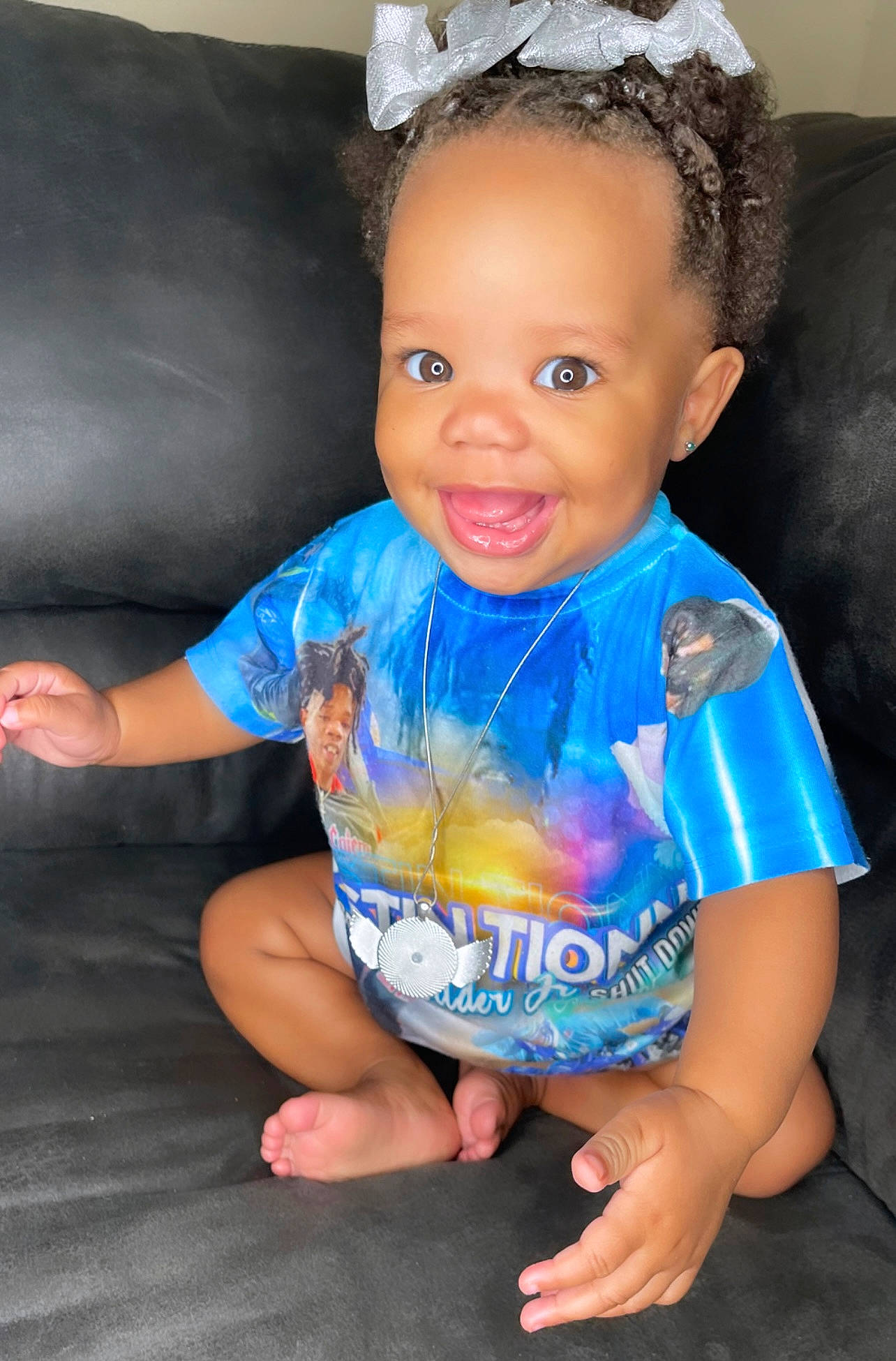 Naveah is registered to the contest to win money with this photo: arm, azure, baby_toddler_clothing, cheek, chin, eye, face, facial_expression, flash_photography, hair, hairstyle, hand, happy, head, human_body, joy, mouth, organ, person, skin