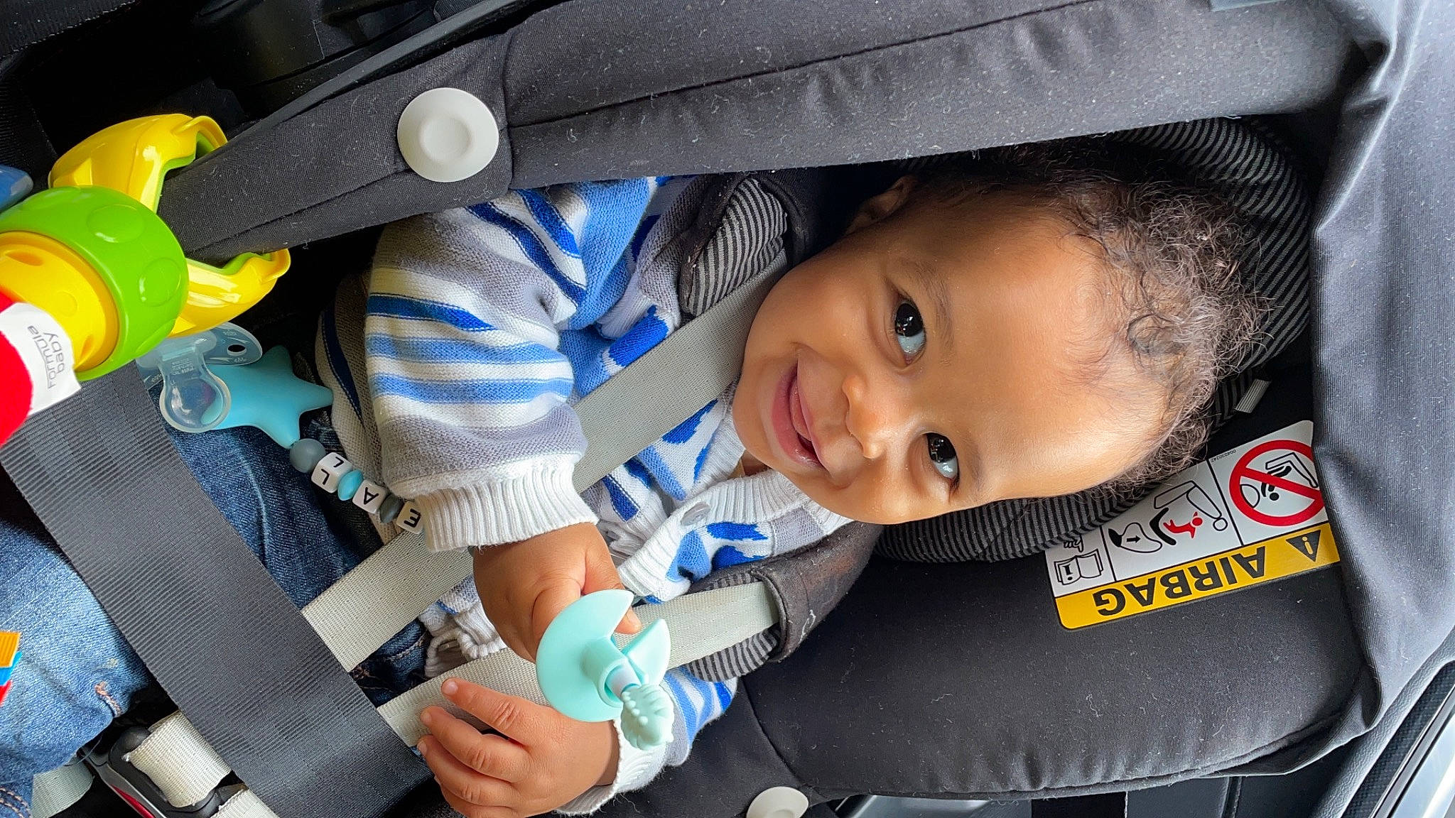 Neal participe au concours pour gagner de l'argent avec cette photo : auto_part, automotive_design, baby, baby_carriage, blue, bottle, car_seat, child, electric_blue, eye, hairstyle, joy, motor_vehicle, people, person, plastic_bottle, product, skin, smile, toddler