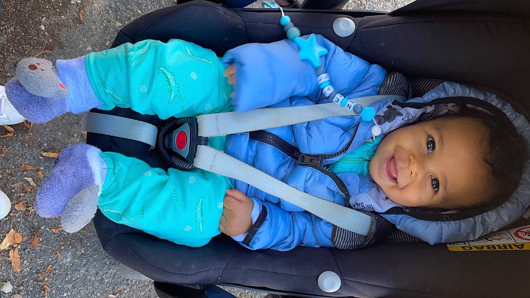 Neal participe au concours pour gagner de l'argent avec cette photo : azure, baby, baby_carriage, baby_products, baby_toddler_clothing, blue, child, comfort, electric_blue, fun, grass, joy, lap, person, plastic, sitting, smile, toddler, tree
