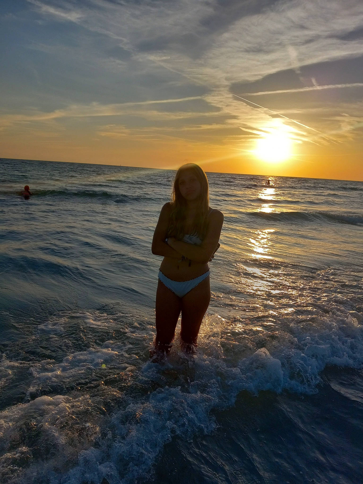 Rihanna is registered to the contest to win money with this photo: afterglow, astronomical_object, beach, cloud, coastal_and_oceanic_landforms, dusk, flash_photography, fun, happy, horizon, people_in_nature, people_on_beach, person, shore, sky, sun, sunlight, sunrise, sunset, under_exposed