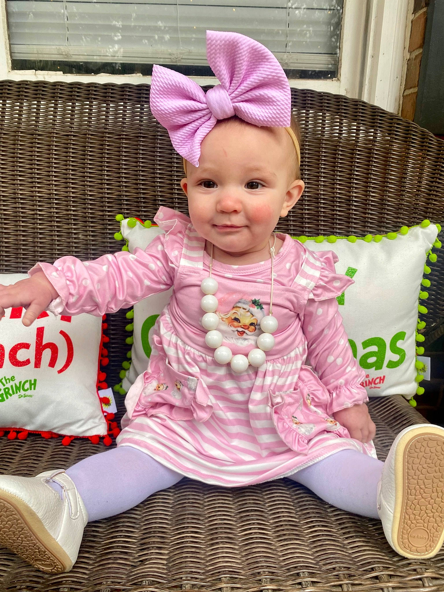 Alaina-lynn is registered to the contest to win money with this photo: baby, baby_toddler_clothing, beanie, cap, child, costume_hat, fashion_accessory, happy, head, knit_cap, magenta, pattern, person, pink, purple, sitting, sleeve, smile, textile, toddler