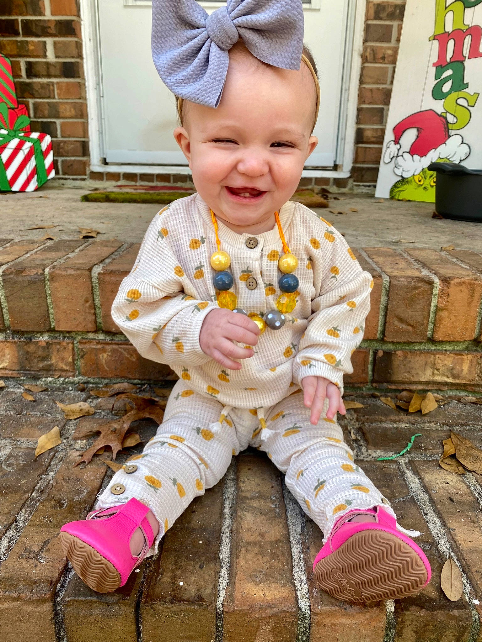 Alaina-lynn is registered to the contest to win money with this photo: baby, baby_toddler_clothing, child, costume, costume_hat, event, face, facial_expression, fun, grass, happy, hat, magenta, pattern, person, pink, skin, sleeve, smile, toddler