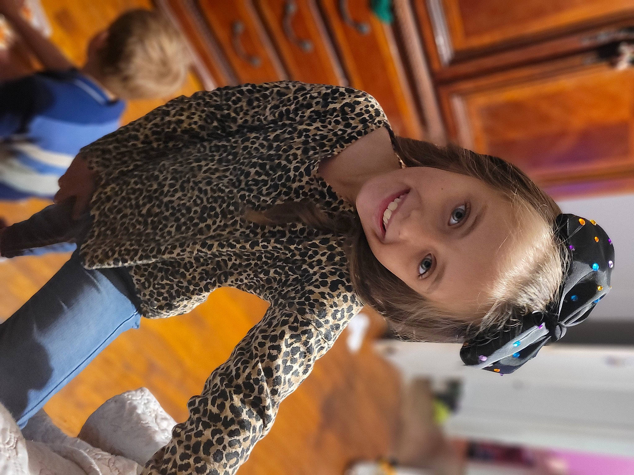 Savanna is registered to the contest to win money with this photo: automotive_design, child, fashion_accessory, fashion_design, flash_photography, flooring, fun, happy, joy, leisure, pattern, person, personal_protective_equipment, recreation, room, smile, street_fashion, t_shirt, wood