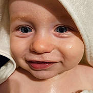 Anton participe au concours pour gagner de l'argent avec cette photo : baby, child, face, smile, blue_eyes, towel, skin, closeup, happy, cute, infant, portrait, hand, soft_texture, expression, newborn, adorable, person, human, warm