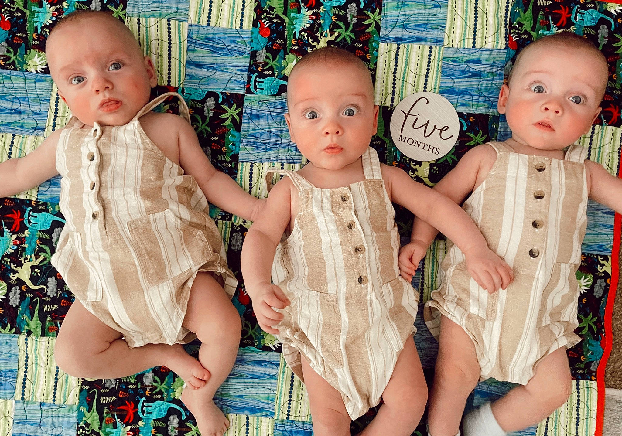 Steven is registered to the contest to win money with this photo: baby, baby_toddler_clothing, blue, cheek, child, eye, face, facial_expression, fashion, fun, green, happy, head, human, iris, organ, person, playing_with_kids, skin, social_group