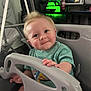 Kingston joined the competition — help win amazing prizes! background, blonde_hair, child, cute, face, furniture, green_light, hand, happy, indoor, person, play, rosy_cheeks, seat, shirt, short_sleeve, smiling, swing, toddler, toy