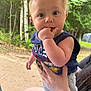 baby, child, hand, fingers, person, outdoor, forest, trees, greenery, clothing, shorts, sleeveless_shirt, skin, face, eyes, hair, holding, nature, summer, curious