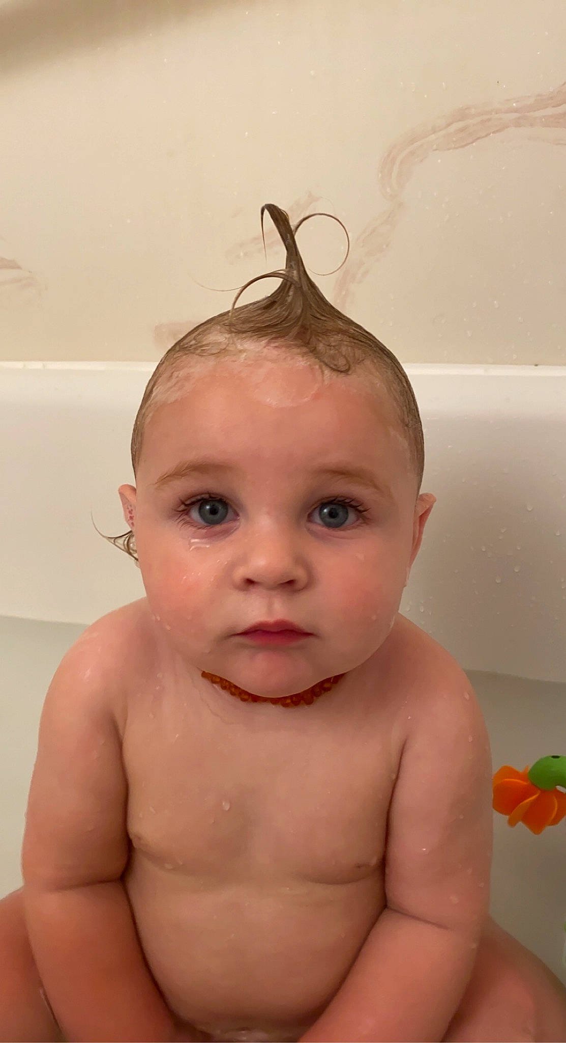 Koa is registered to the contest to win money with this photo: baby_bathing, bathing, bathroom, cheek, chin, ear, eye, eyebrow, eyelash, forehead, hair, head, human_body, lip, neck, nose, organ, person, skin, stomach