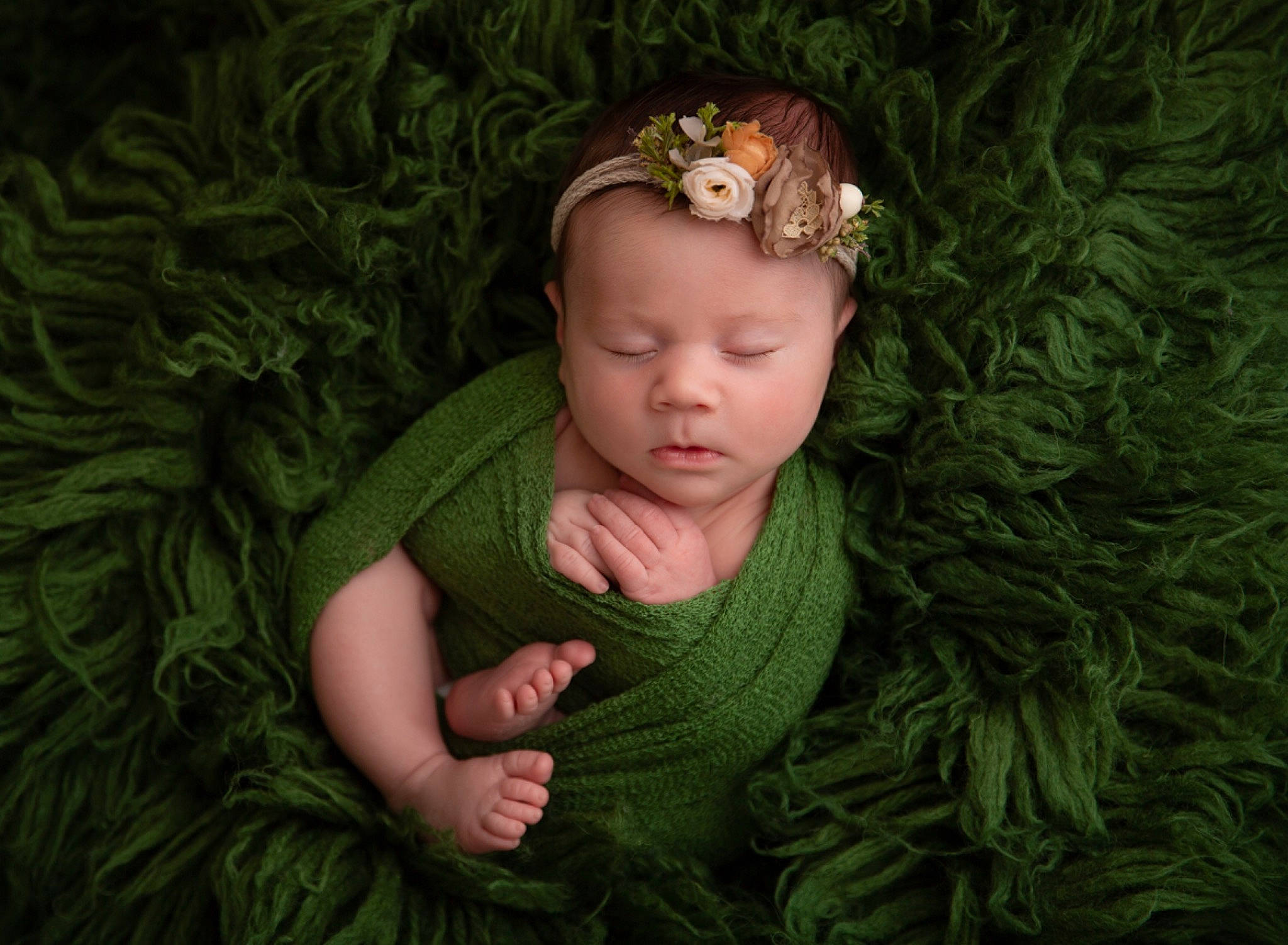 Cecelia is registered to the contest to win money with this photo: baby, baby_toddler_clothing, child, fawn, finger, grass, grass_family, hand, headband, headgear, headpiece, human_body, iris, people_in_nature, person, plant, skin, terrestrial_plant, toddler, tree