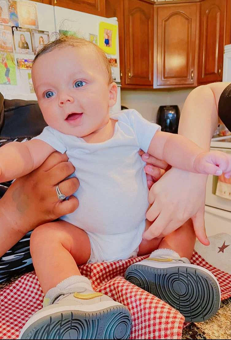 Darion joined the competition — help win amazing prizes! arm, baby, baby_toddler_clothing, cabinetry, comfort, drawer, finger, hairstyle, human_leg, joint, knee, leg, muscle, people, person, product, skin, sock, surprise, thigh