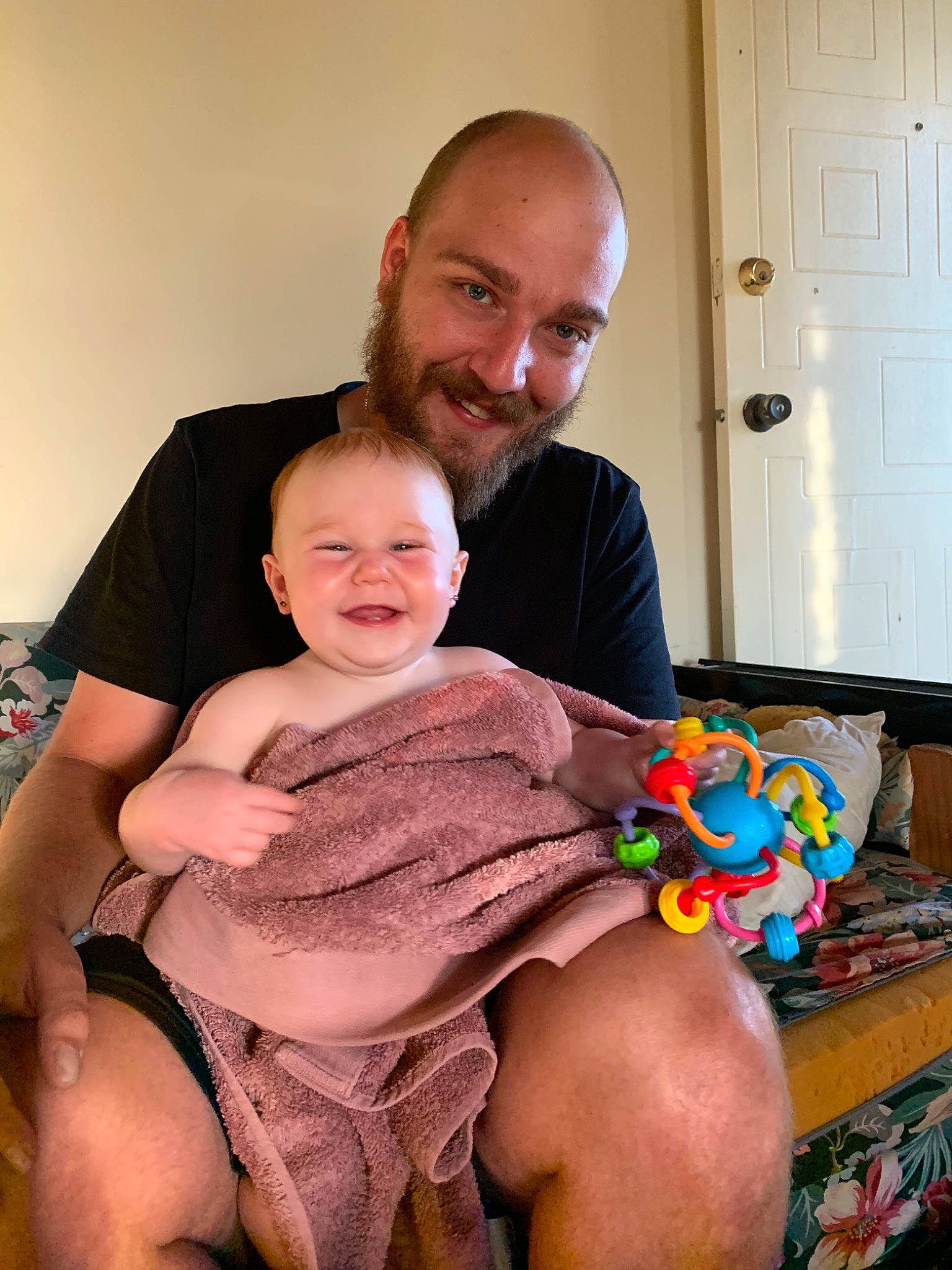 Allegra joined the competition — help win amazing prizes! arm, baby, child, family, father, finger, joy, lap, leg, male, muscle, person, sitting, smile, toddler, vacation