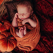 Leo joined the competition — help win amazing prizes! newborn, baby, sleeping, basket, blanket, pumpkin, autumn, fall_leaves, orange, cozy, cute, infant, resting, portrait, seasonal, decor, wood, peaceful, wrapped, soft