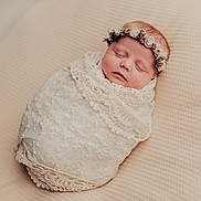 Luna joined the competition — help win amazing prizes! newborn, baby, sleeping, lace, blanket, headband, flower_crown, infant, soft_texture, beige, wrapped, portrait, peaceful, cute, resting, cozy, closeup, baby_face, delicate, soft_lighting