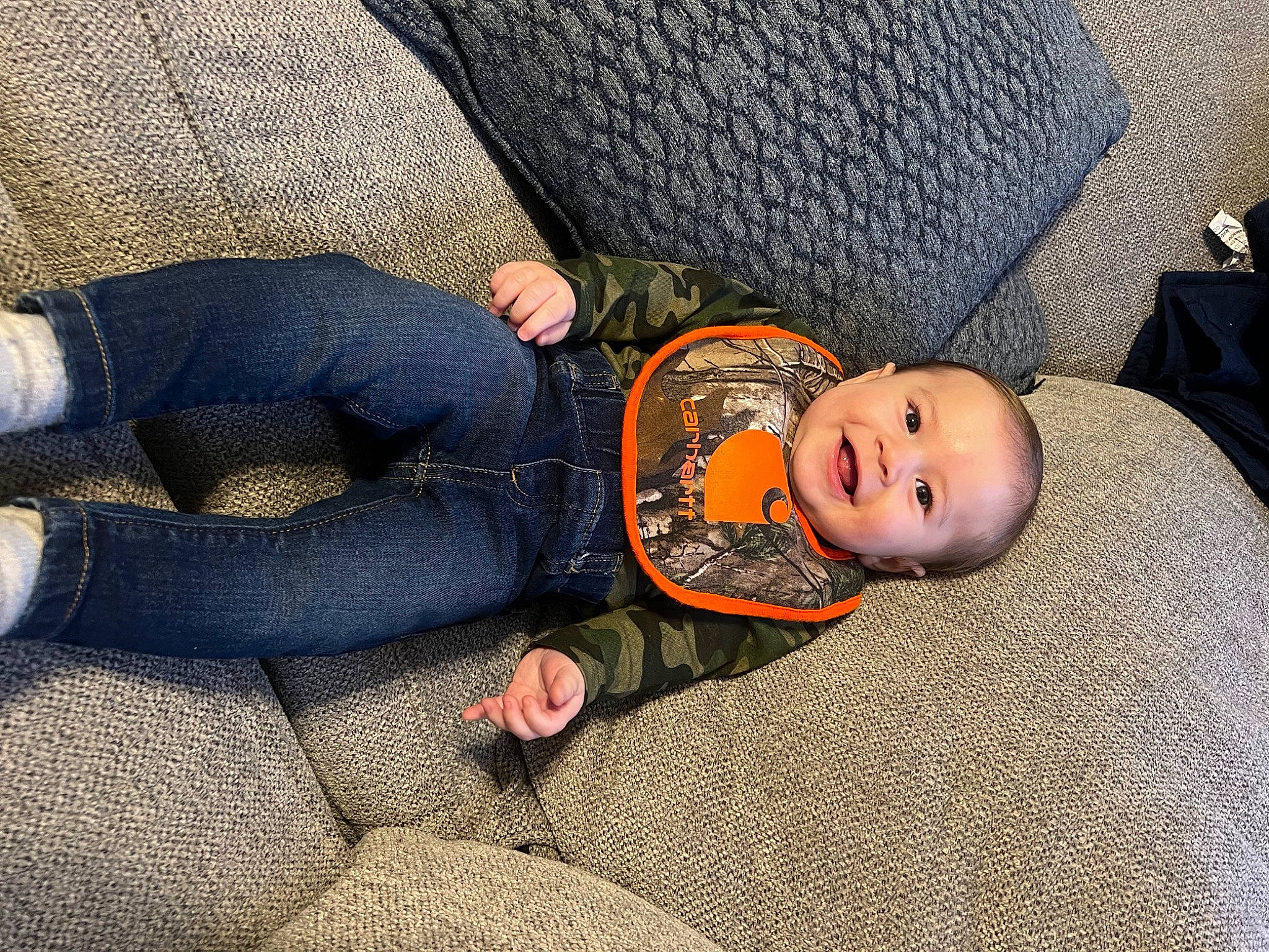 Waylynn is registered to the contest to win money with this photo: baby, baby_products, baby_toddler_clothing, bedding, child, comfort, couch, electric_blue, finger, flooring, grass, grey, joy, linens, nap, person, sitting, sleep, toddler, tree