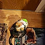 Velvet is registered to the contest to win money with this photo: animal, bell, calico_cat, cat, collar, curious, domestic_cat, doormat, eye_contact, feline, floor_mat, green_eyes, holly, horse_image, indoor, looking_up, pet, tail, whiskers, wooden_floor