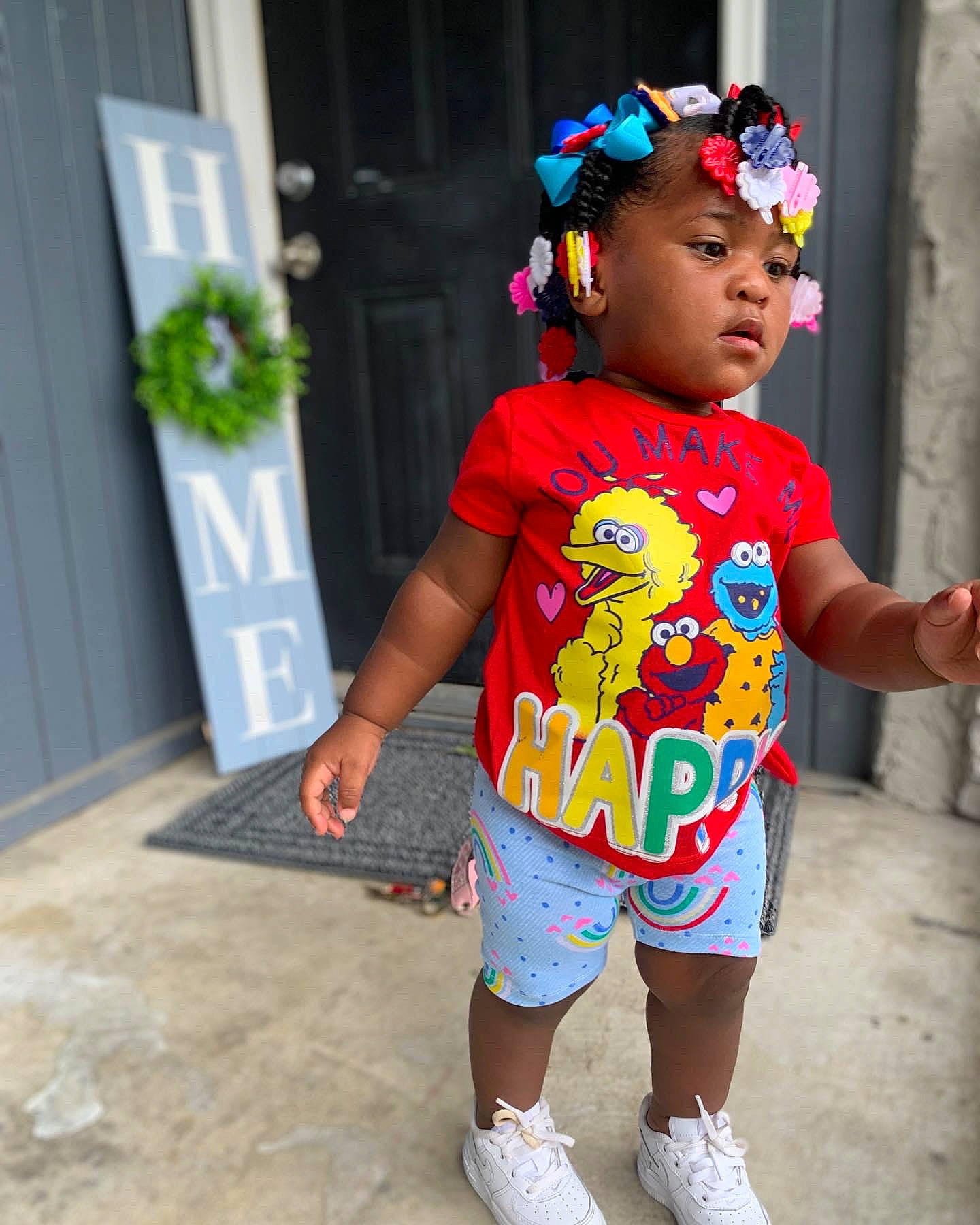Derrelisa is registered to the contest to win money with this photo: baby, baby_toddler_clothing, child, cool, door, eyewear, fashion_accessory, fashion_design, flowerpot, fun, happy, headband, headwear, human_leg, magenta, pattern, person, plant, shoulder, sleeve