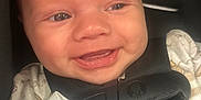 Carter joined the competition — help win amazing prizes! baby, smiling, car_seat, blanket, face, child, infant, close_up, seatbelt, cute, happy, skin, head, clothing, straps, indoors, human, person, mouth, teeth