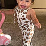 Matilda joined the competition — help win amazing prizes! toddler, child, smiling, standing, toy, pink, football_pattern, carpet, indoor, happy, clothing, barefoot, person, cute, playtime, fun, young, portrait, home, baby
