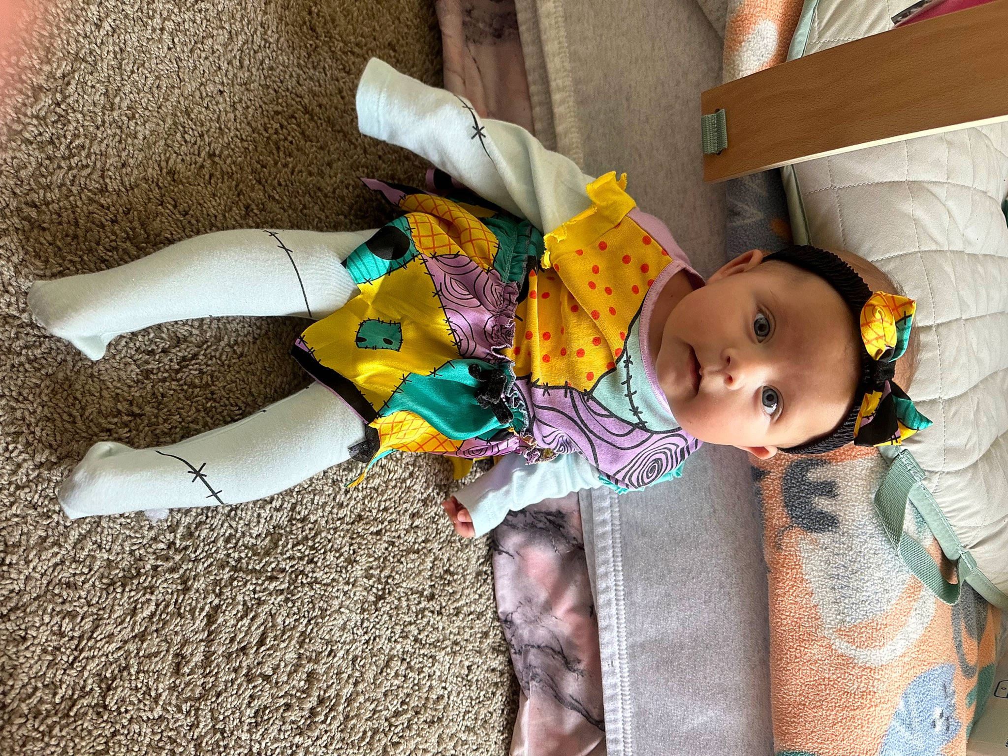 Avery joined the competition — help win amazing prizes! baby, baby_products, baby_toddler_clothing, child, comfort, fun, happy, human_leg, pattern, person, room, sitting, sock, textile, thigh, toddler