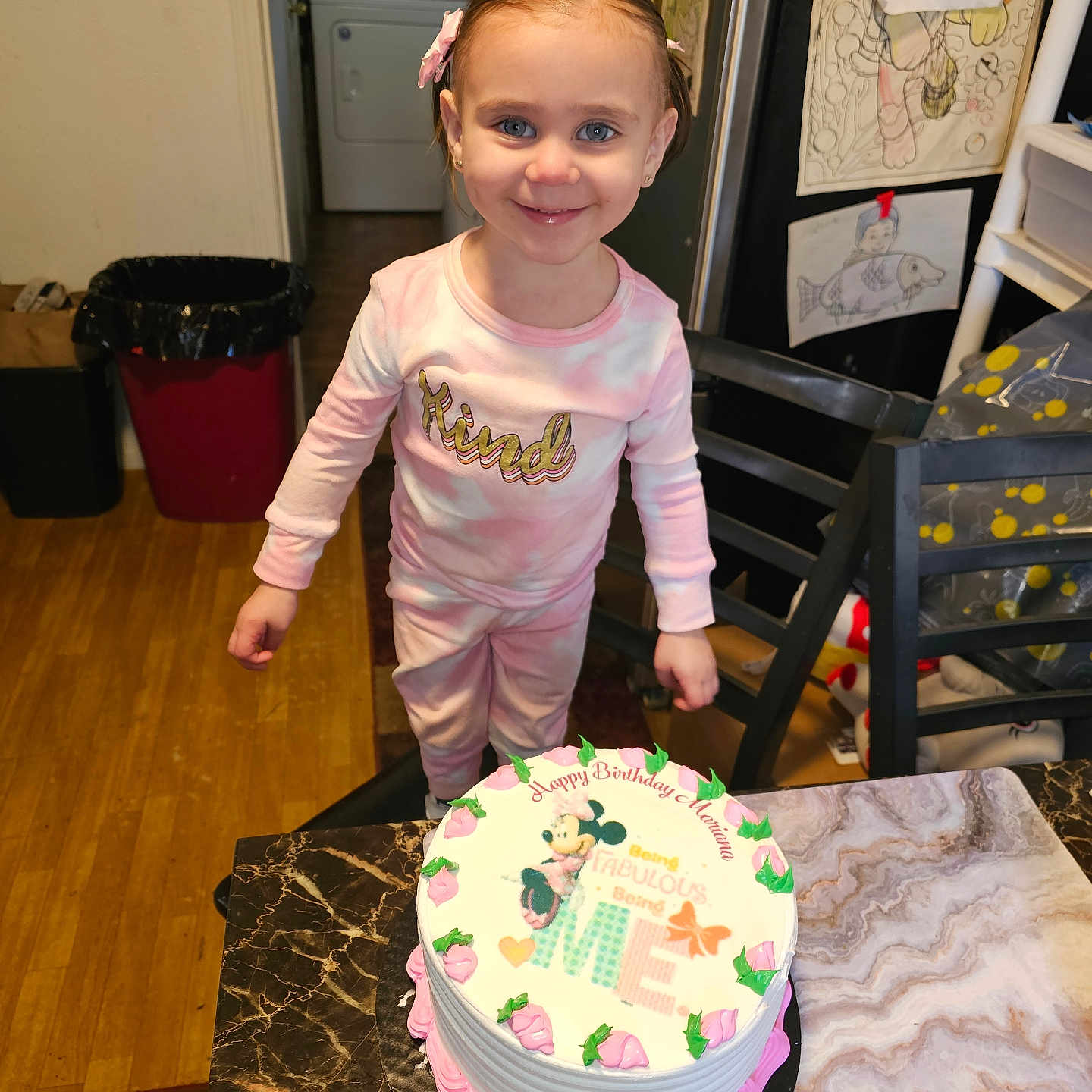 Mariana is registered to the contest to win money with this photo: birthdaycake, cake, child, clothing, cream, dessert, diningtable, face, female, food, furniture, girl, head, icing, person, photography, portrait, t_shirt, table, wood