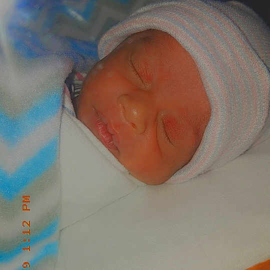 Gerald is registered to the contest to win money with this photo: baby, child