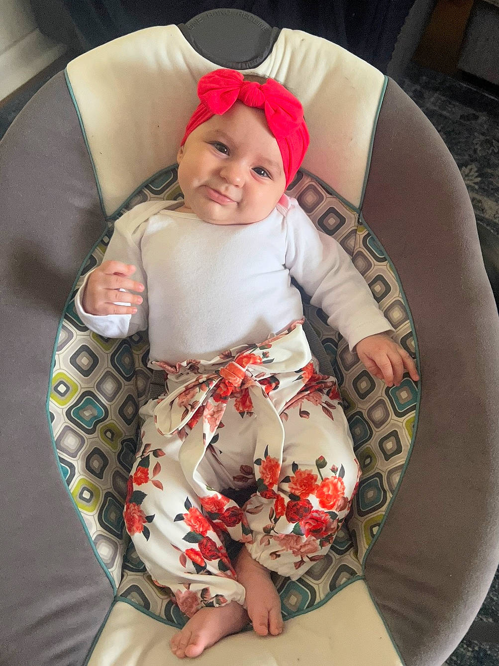 Aspen joined the competition — help win amazing prizes! baby, baby_products, baby_toddler_clothing, car_seat, carmine, chair, child, comfort, face, headwear, human_body, human_leg, joy, lap, pattern, person, sitting, sleeve, smile, sock