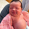 Lillian joined the competition — help win amazing prizes! baby, newborn, smiling, blanket, indoor, person, diaper, skin, face, head, arm, torso, happy, resting, home, floor, furniture, warm, closeup, infant