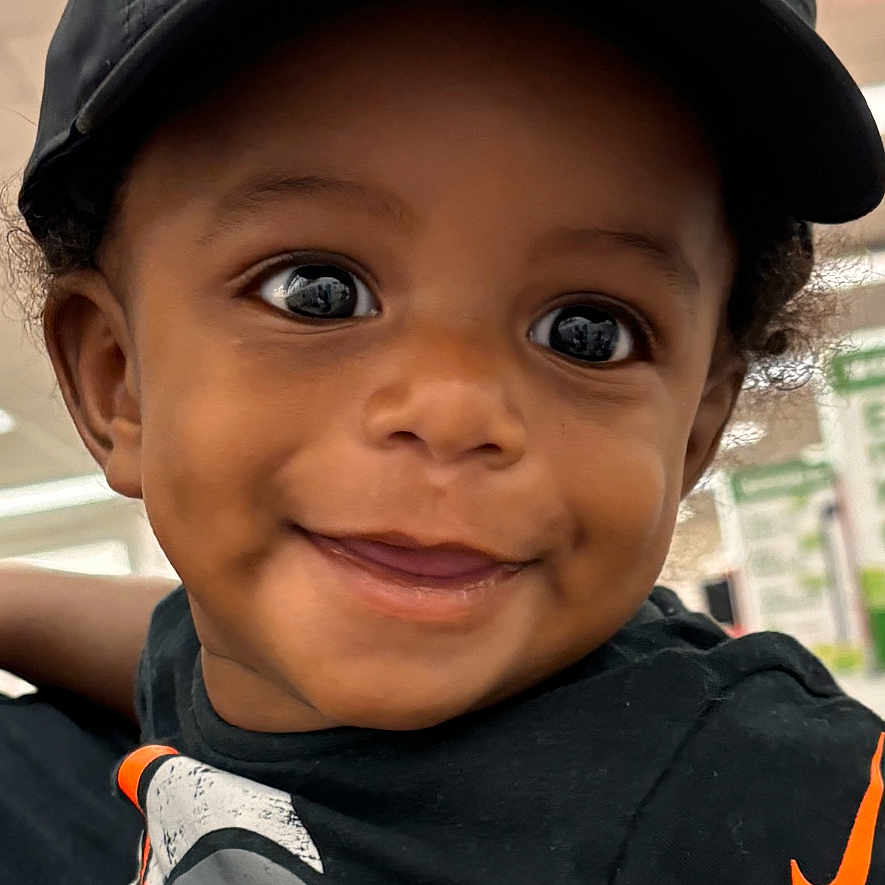 Amir joined the competition — help win amazing prizes! baseballcap, bodypart, boy, cap, child, clothing, coat, face, finger, happy, hat, head, jacket, male, person, photography, portrait, smile, sunhat, t_shirt