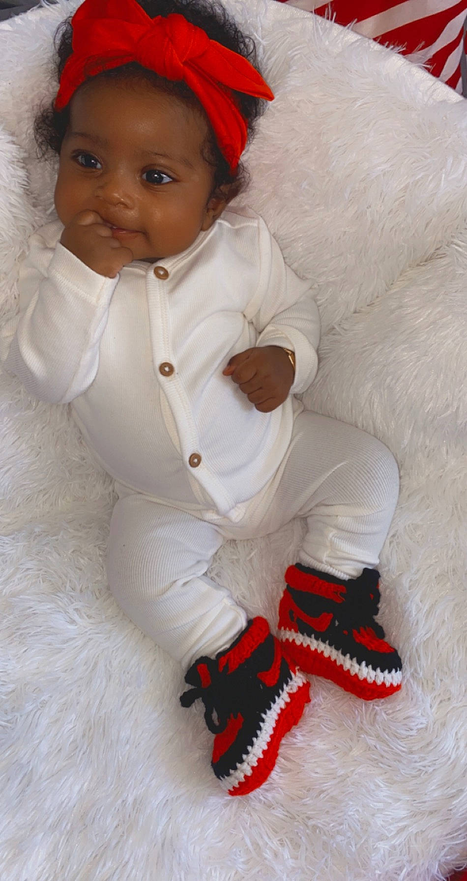 Lily is registered to the contest to win money with this photo: baby, baby_products, baby_toddler_clothing, child, person, shoe, toddler, white, wool