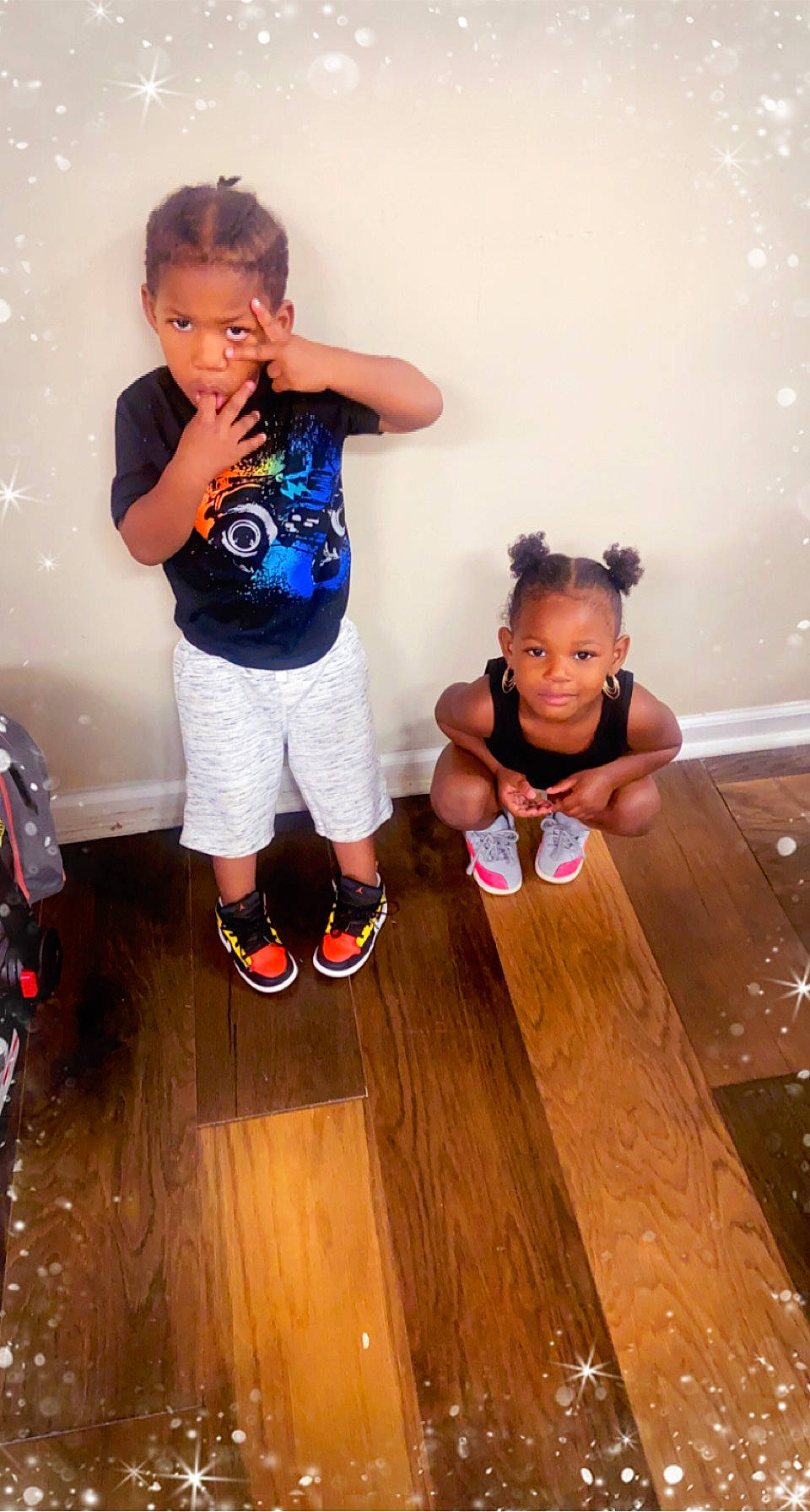 Laniyah is registered to the contest to win money with this photo: baby_toddler_clothing, child, face, flash_photography, floor, flooring, fun, hair, hairstyle, happy, hardwood, head, leisure, person, shorts, skin, standing, t_shirt, thigh, toddler