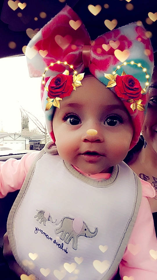 Zayla is registered to the contest to win money with this photo: baby, cheek, child, cool, face, fashion_accessory, forehead, hair_accessory, head, headgear, headpiece, lip, person, pink, skin, smile, toddler