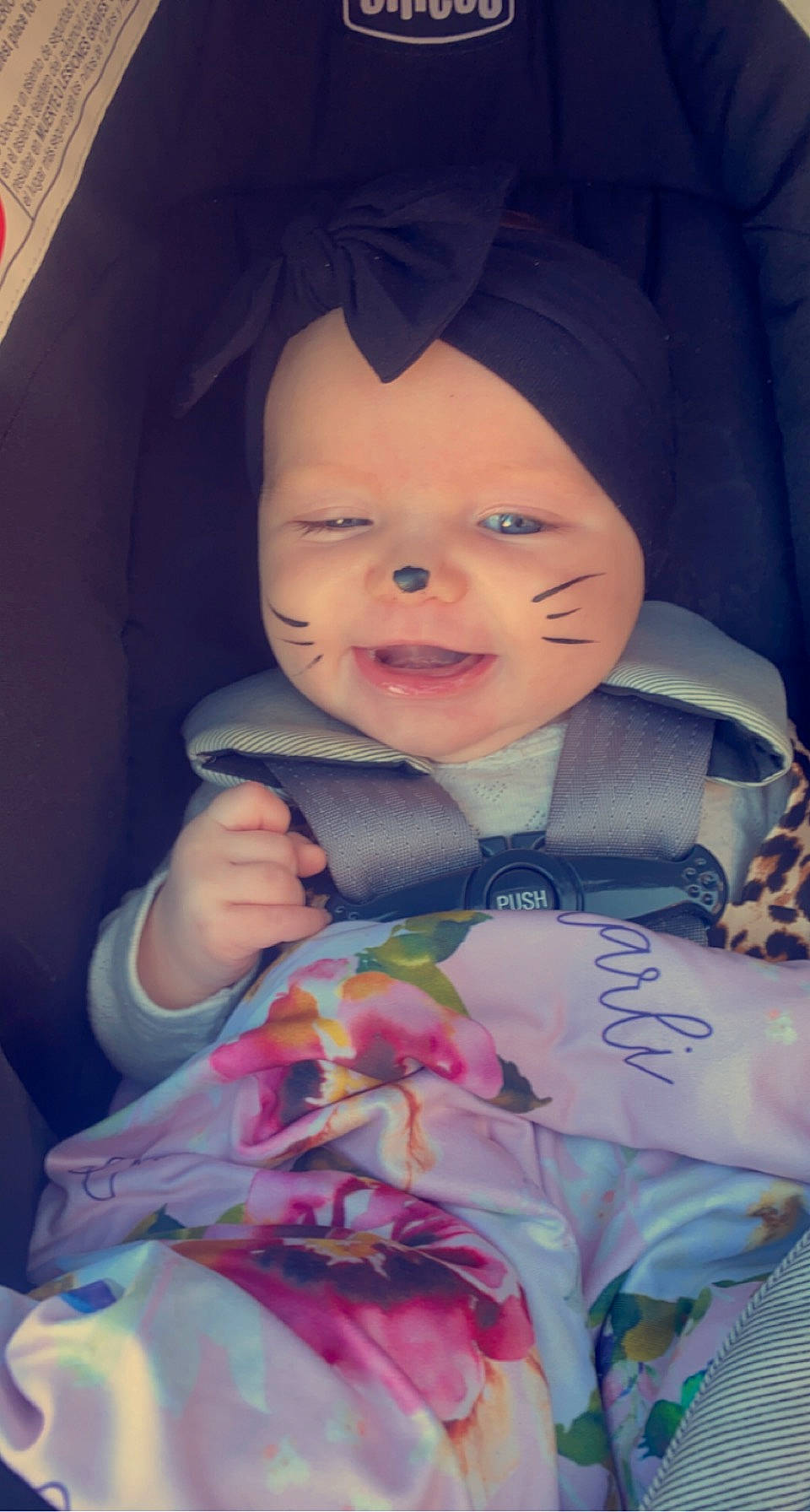 Charli Rain is registered to the contest to win money with this photo: baby, baby_carriage, baby_in_car_seat, baby_products, baby_toddler_clothing, cap, cheek, child, electric_blue, fun, happy, human_body, lip, person, pink, product, purple, skin, smile, textile