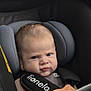 Estebàn participe au concours pour gagner de l'argent avec cette photo : baby, car_seat, infant, child, seatbelt, car_interior, serious_face, headrest, straps, clothing, blanket, person, portrait, sitting, indoors, seat, safety, vehicle, young_child, cute