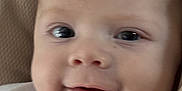Estebàn participe au concours pour gagner de l'argent avec cette photo : baby, baby_face, beige, cheeks, child, closeup, cute, eyes, face, happy, indoors, infant, newborn, person, portrait, skin, smile, soft_texture, white_clothing, young