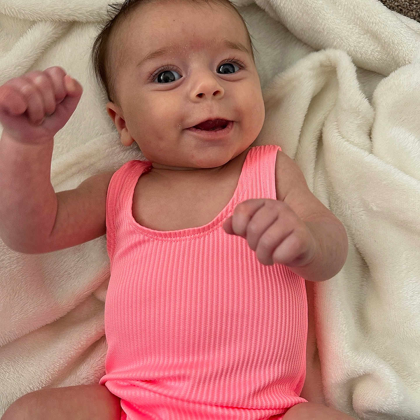 Frankie is registered to the contest to win money with this photo: baby, blanket, bodypart, clothing, face, finger, hand, happy, head, newborn, person, photography, portrait, quilt, shorts, sitting, smile, t_shirt, tanktop, towel