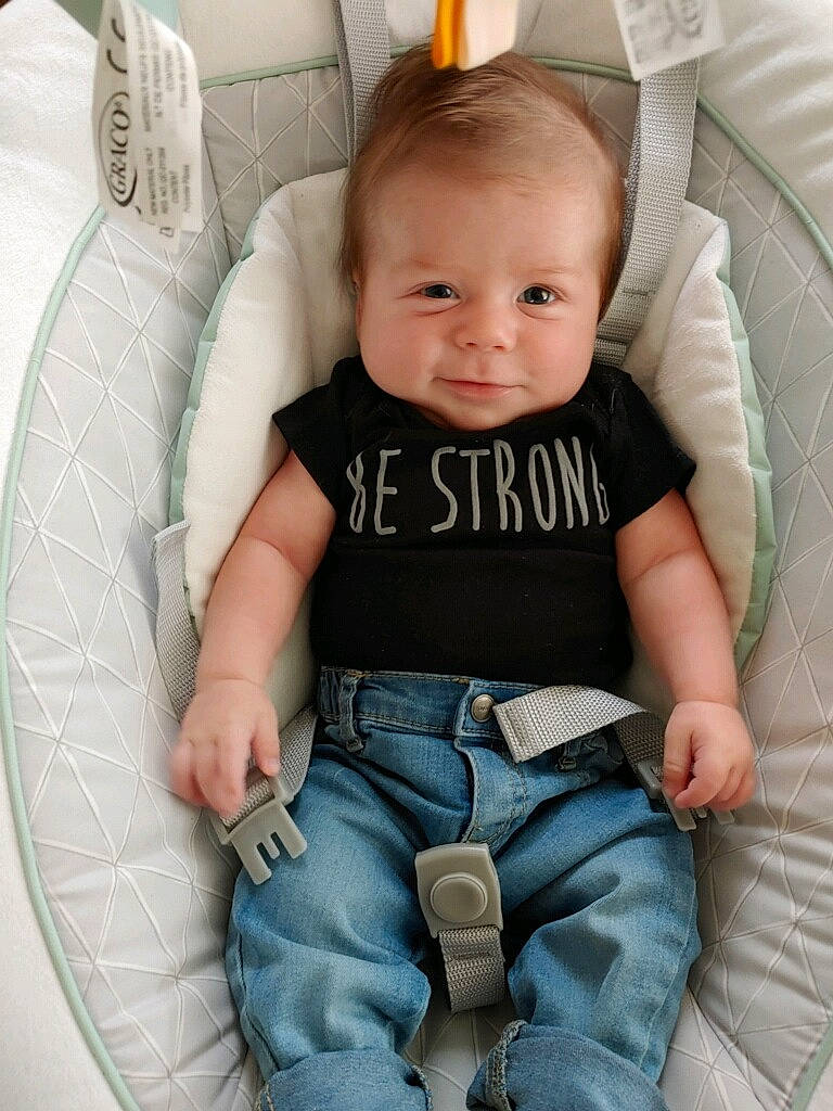 Clark joined the competition — help win amazing prizes! arm, baby, baby_toddler_clothing, cheek, clothing, comfort, eye, face, finger, hairstyle, hand, head, human_body, iris, leg, mouth, person, skin, sleeve, smile