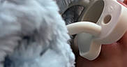 Brayden is registered to the contest to win money with this photo: baby, infant, pacifier, blanket, fluffy, blue, sleeping, cozy, close_up, portrait, nursery, soft, textile, bedding, snuggling, indoors, comfort, child, pastel, peaceful