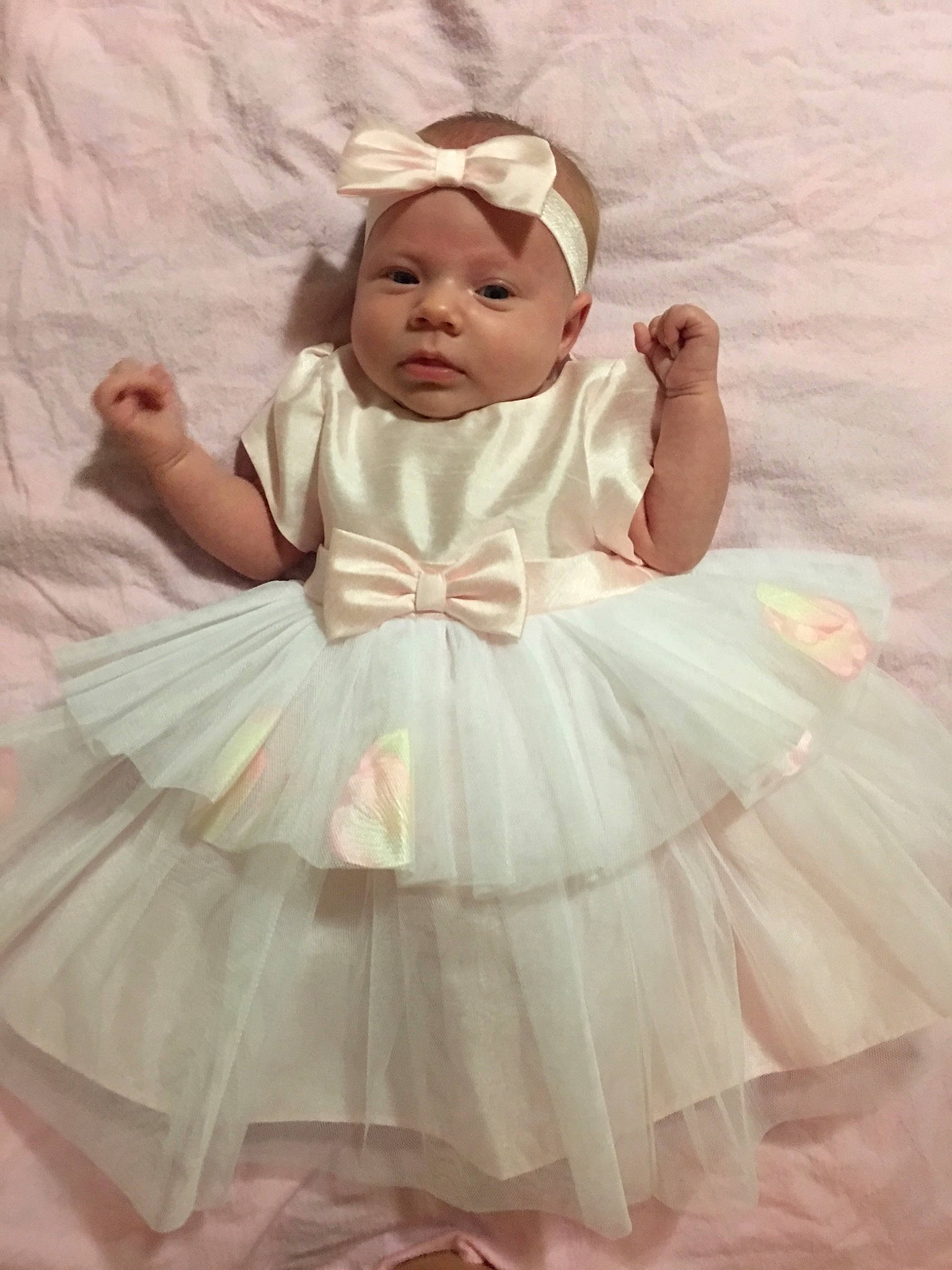 Violet joined the competition — help win amazing prizes! baby, baby_toddler_clothing, blond, bridal_accessory, day_dress, dress, embellishment, face, fun, happy, headgear, headpiece, iris, outerwear, pattern, person, pink, ruffle, skin, sleeve