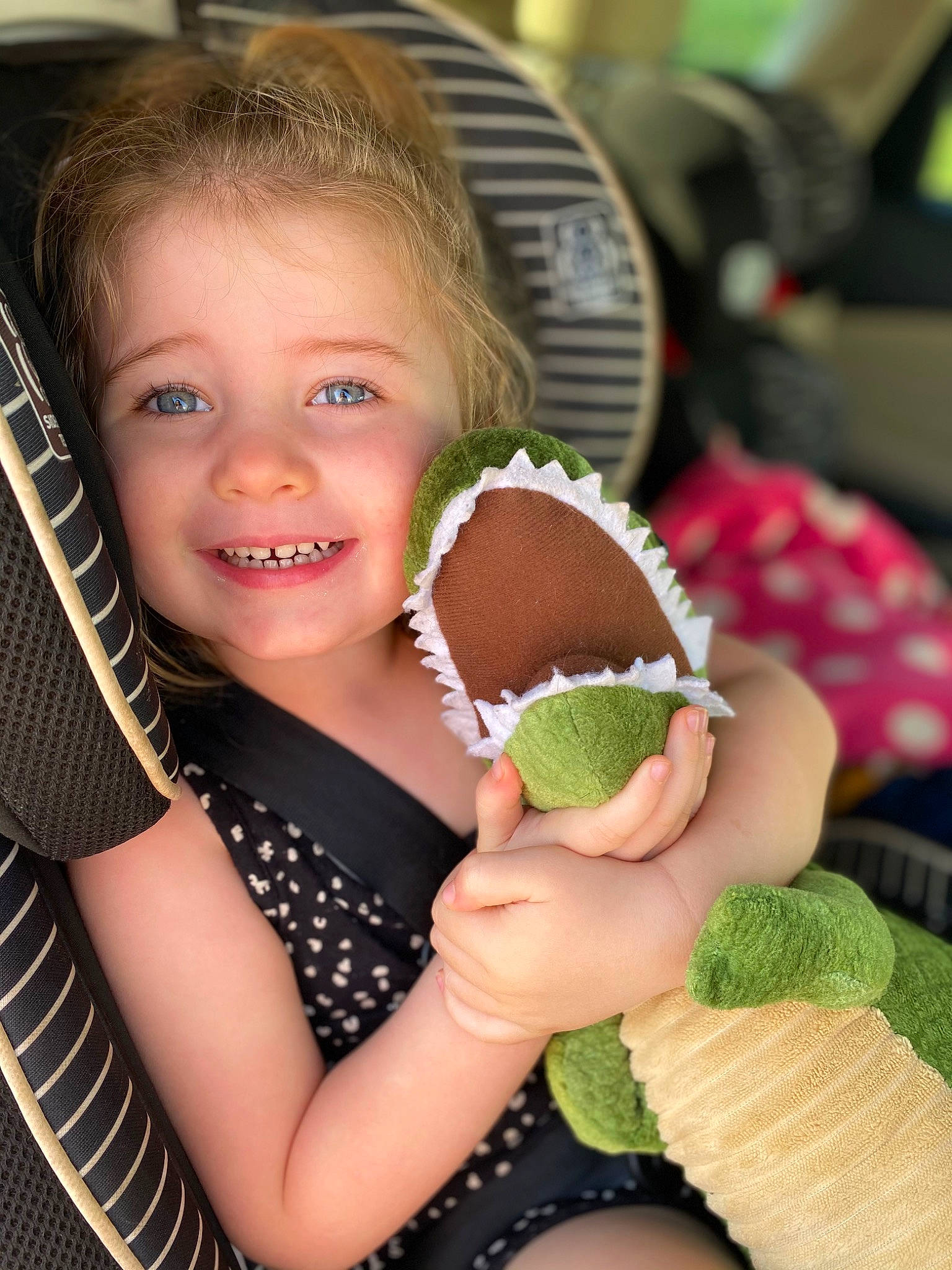 Lottie is registered to the contest to win money with this photo: baby_products, ball, chair, child, finger, fun, gesture, glove, grass, green, hand, happy, head, joy, mouth, nail, person, skin, smile, sweetness