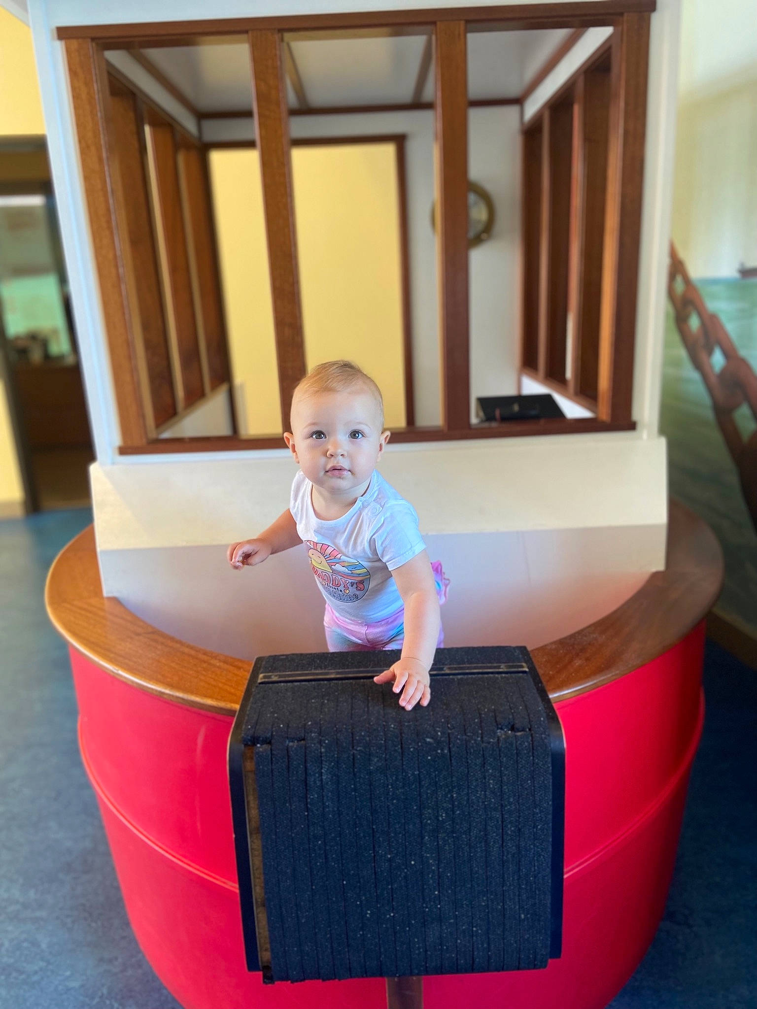 Faye joined the competition — help win amazing prizes! baby, baby_toddler_clothing, child, circle, comfort, floor, flooring, fun, hardwood, leisure, person, play, rectangle, room, sitting, smile, t_shirt, toddler, vacation, varnish